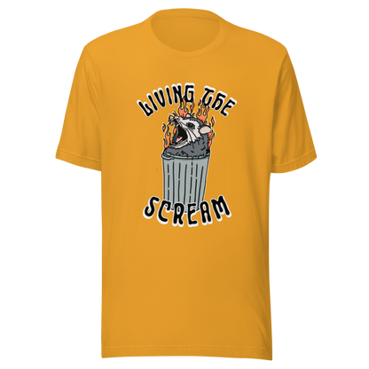 Mustard yellow t-shirt with a screaming possum in a flaming trash can. ‘Living the Scream’ text above. The perfect chaos-core existential crisis tee.