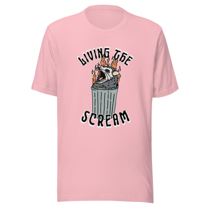 Pink t-shirt with a screaming possum in a flaming trash can. ‘Living the Scream’ text above. The perfect chaos-core existential crisis tee.